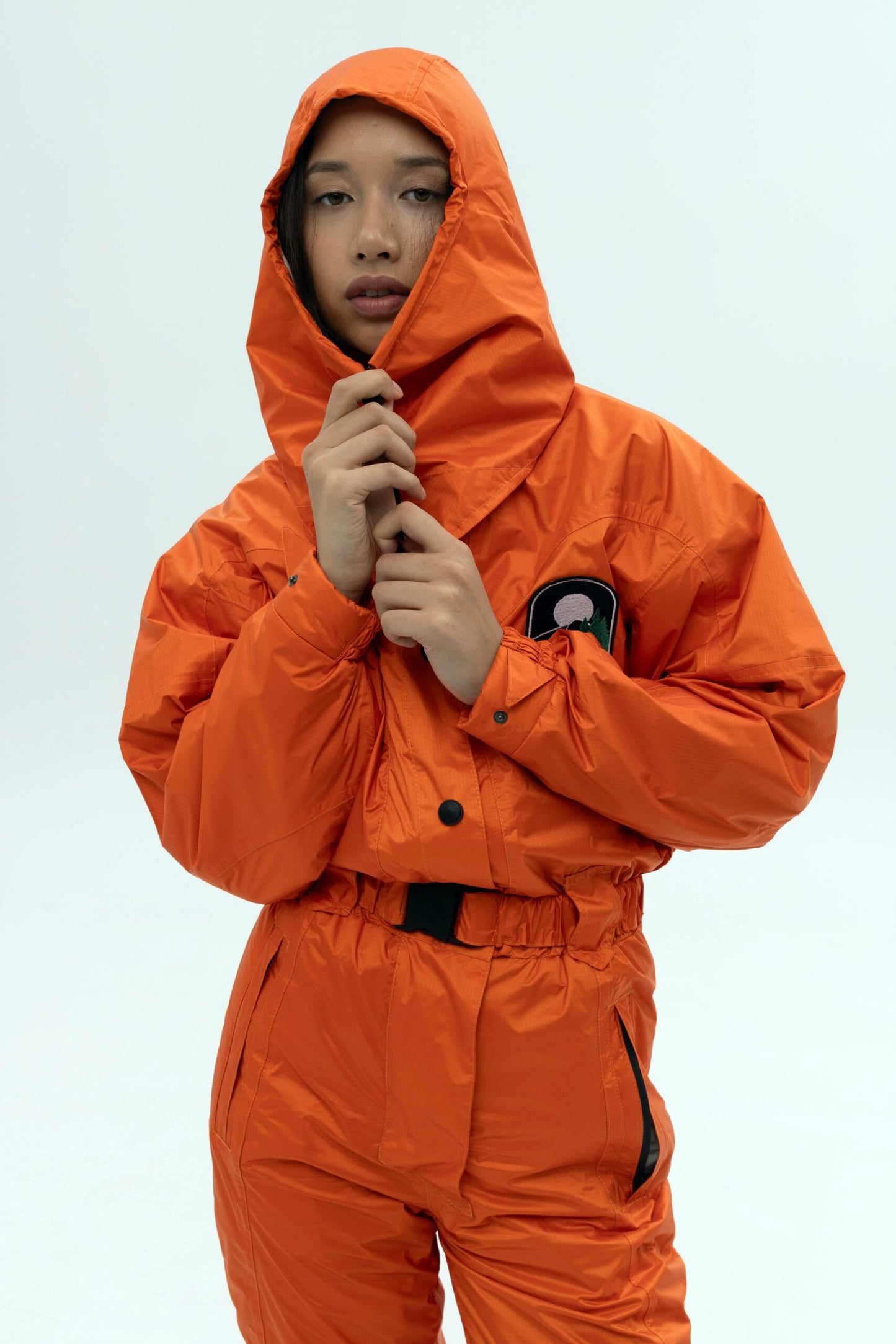 Жіночий помаранчевий комбінезон для лиж та сноуборду