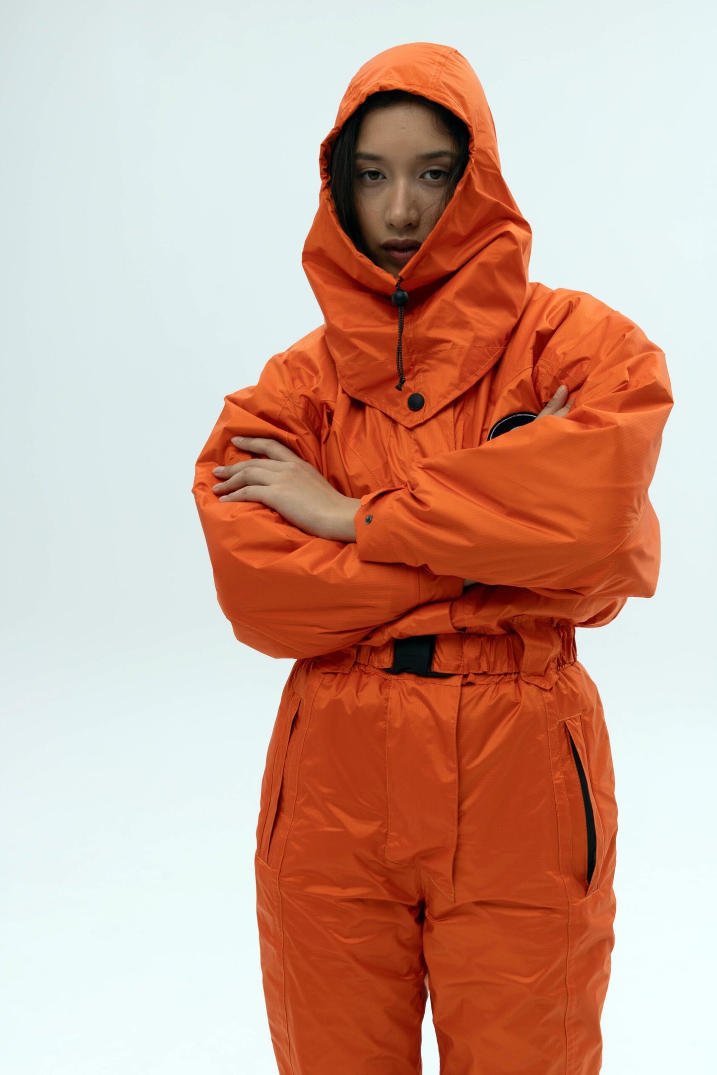 Жіночий помаранчевий комбінезон для лиж та сноуборду