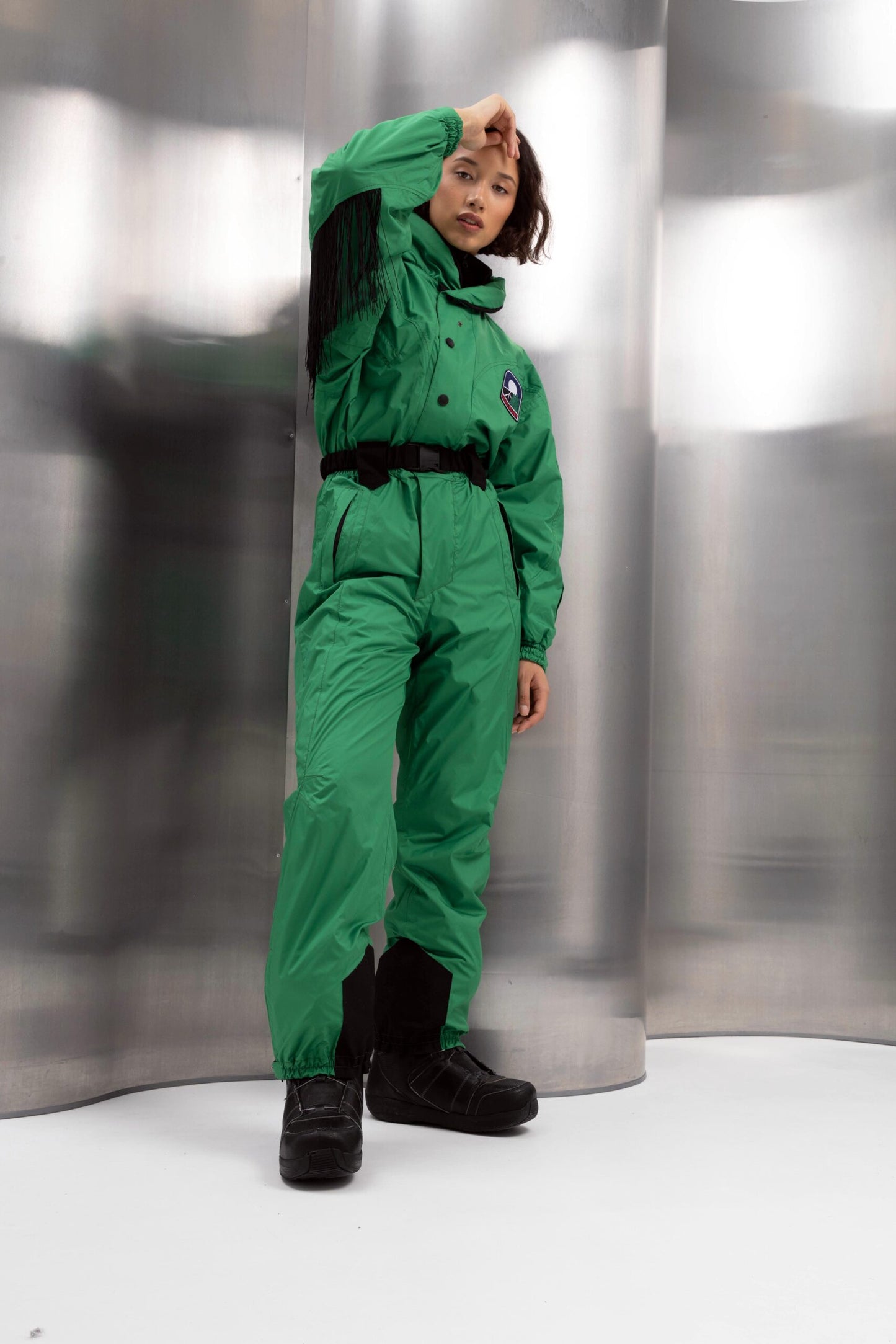 Жіночий зелений комбінезон для лиж та сноуборду