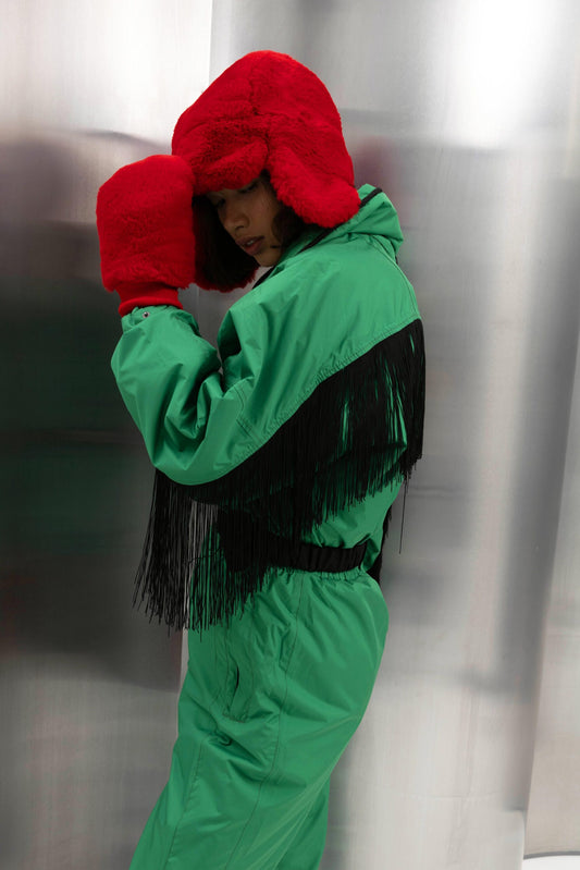 Жіночий зелений комбінезон для лиж та сноуборду